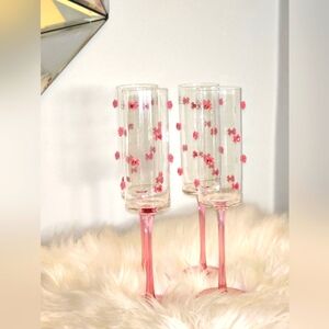 Champagne Flutes with punk Bows and red heart in the middle